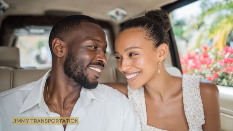 Elegant couple relaxing in the back seat of a luxury chauffeured vehicle in Nassau, enjoying premium comfort and personalized service.
